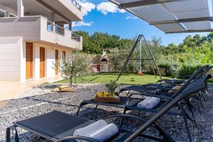 Vonkajšia záhrada v ubytovaní Villa Jelena