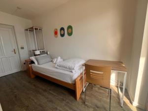 Giường trong phòng chung tại Hotel Lido