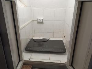 a stove top oven sitting in a kitchen at CASA GENTILE in Giovinazzo +6 photos