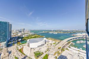 an aerial view of a city with a harbor at Bayside Luxury: Studio Near Bayfront Park in Miami