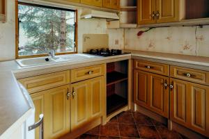 A kitchen or kitchenette at Holender Przy Plaży