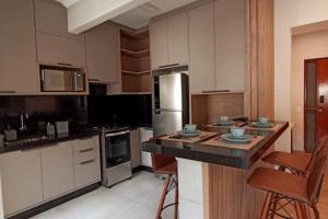 A cozinha ou cozinha compacta de Super central e com muito charme