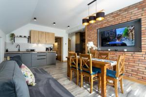 Kuchyňa alebo kuchynka v ubytovaní ARAMIKA apartamenty