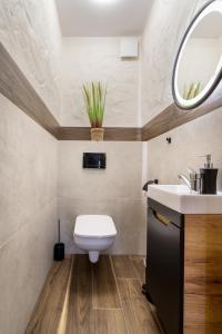 Kúpeľňa v ubytovaní ARAMIKA apartamenty
