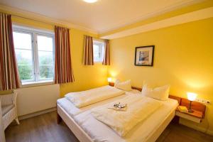 Katil atau katil-katil dalam bilik di Wohnung-Steuerbord