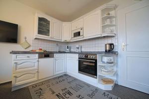 Cucina o angolo cottura di Wohnung-Hafenblick
