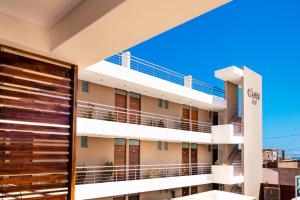 an external view of a building with balconies at Hotel Costa Sur in Camaná