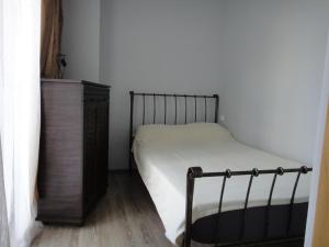 Postelja oz. postelje v sobi nastanitve DestinationBTM Apartment in Batumi