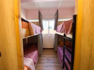 Cama o camas de una habitación en Casa Pandora Hostel Women Only