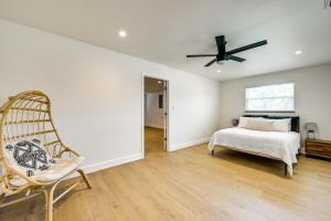 a bedroom with a bed and a ceiling fan at Naples Duplex Home with Private Pool and Lanai! in Naples