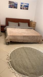 Postel nebo postele na pokoji v ubytování Cozy One Bed Apt D2 1007