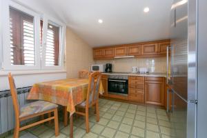 Kuchyň nebo kuchyňský kout v ubytování Guest house Lenka