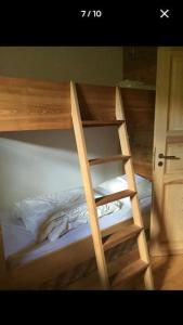 an empty bunk bed in a room at maison de campagne Mezenc. in Saint-Front