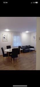 Ein Sitzbereich in der Unterkunft Hotel Anker