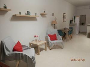 Posezení v ubytování Studio Areti + 28 fotografií
