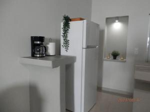 Kuchyň nebo kuchyňský kout v ubytování Studio Areti