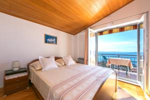Postel nebo postele na pokoji v ubytování Guest house Lenka