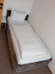 Ein Bett oder Betten in einem Zimmer der Unterkunft Hotel Anker
