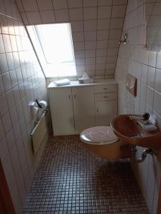 Ein Badezimmer in der Unterkunft Hotel Anker