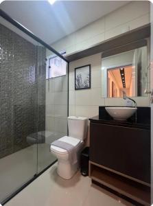 Ένα μπάνιο στο Apartamento aconchegante