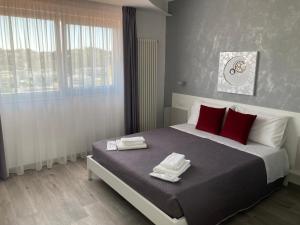 Ένα ή περισσότερα κρεβάτια σε δωμάτιο στο AleVa b&b