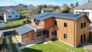 an overhead view of a house with solar panels on it at Vila Berg in Rovensko pod Troskami