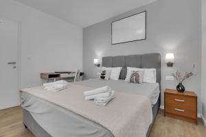 Posteľ alebo postele v izbe v ubytovaní Mediterranean Living 2