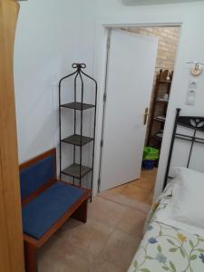 Postel nebo postele na pokoji v ubytování Pensión Antonio Guesthouse