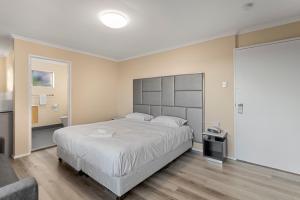 Postel nebo postele na pokoji v ubytování S1 Motel