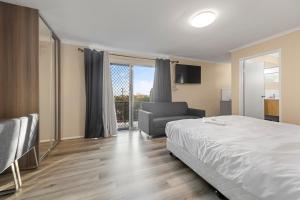 Postel nebo postele na pokoji v ubytování S1 Motel