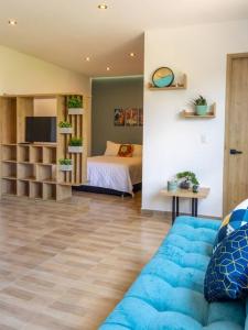 TV a/nebo společenská místnost v ubytování Caobos Center Coliving & Coworking