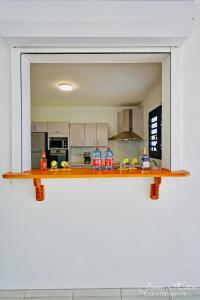 Kuchyň nebo kuchyňský kout v ubytování Villa T4 La Sagesse WS - Piscine Privée