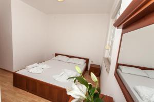 Voodi või voodid majutusasutuse Apartment Tomi - Novalja toas