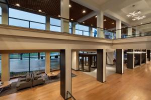 an office building with a view of the ocean at Hilton Burlington Lake Champlain in Burlington