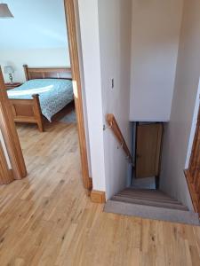 Postel nebo postele na pokoji v ubytování The Attic