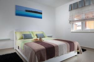 Postel nebo postele na pokoji v ubytování Apartments Vista
