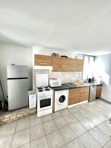 Kuchyň nebo kuchyňský kout v ubytování Ô'Berge & Chambres Avignon + 23 fotografií
