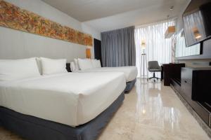 Katil atau katil-katil dalam bilik di Courtyard by Marriott Tuxpan Veracruz