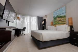 Katil atau katil-katil dalam bilik di Courtyard by Marriott Tuxpan Veracruz