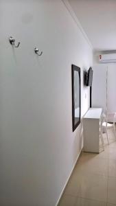 Μια τηλεόραση ή/και κέντρο ψυχαγωγίας στο Flat 109 Carneiros Tamandare Marinas Terreo