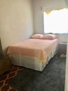 Postel nebo postele na pokoji v ubytování Acogedor Apartamento