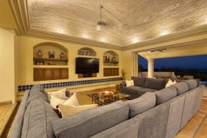 a large living room with a large couch at Casa Stamm in Cabo San Lucas