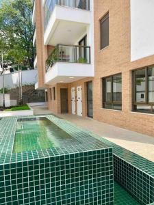 Imagem da galeria de Apartamento boutique no centro em Poços de Caldas