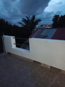 a white fence on top of a roof at MIKEA in Antananarivo