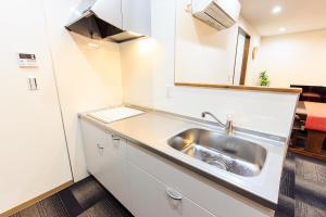 Η κουζίνα ή μικρή κουζίνα στο Sunflower Condo in Nagoya