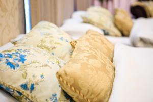Ένα ή περισσότερα κρεβάτια σε δωμάτιο στο Sunflower Condo in Nagoya +29 φωτογραφίες