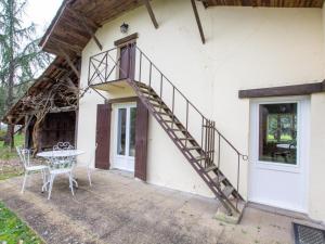 Balkón nebo terasa v ubytování Retraite Périgourdine avec Piscine Partagée, Clim, Vélo et Proximité de Bergerac - FR-1-616-364