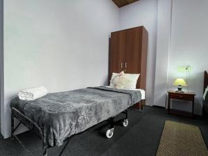 Postel nebo postele na pokoji v ubytování Williams Homestay