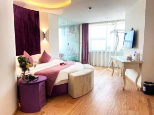 Postel nebo postele na pokoji v ubytování Fresh House Hotel - West Lake Qingchun Branch