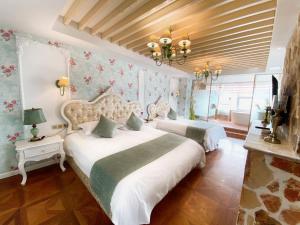 Postel nebo postele na pokoji v ubytování Fresh House Hotel - West Lake Qingchun Branch